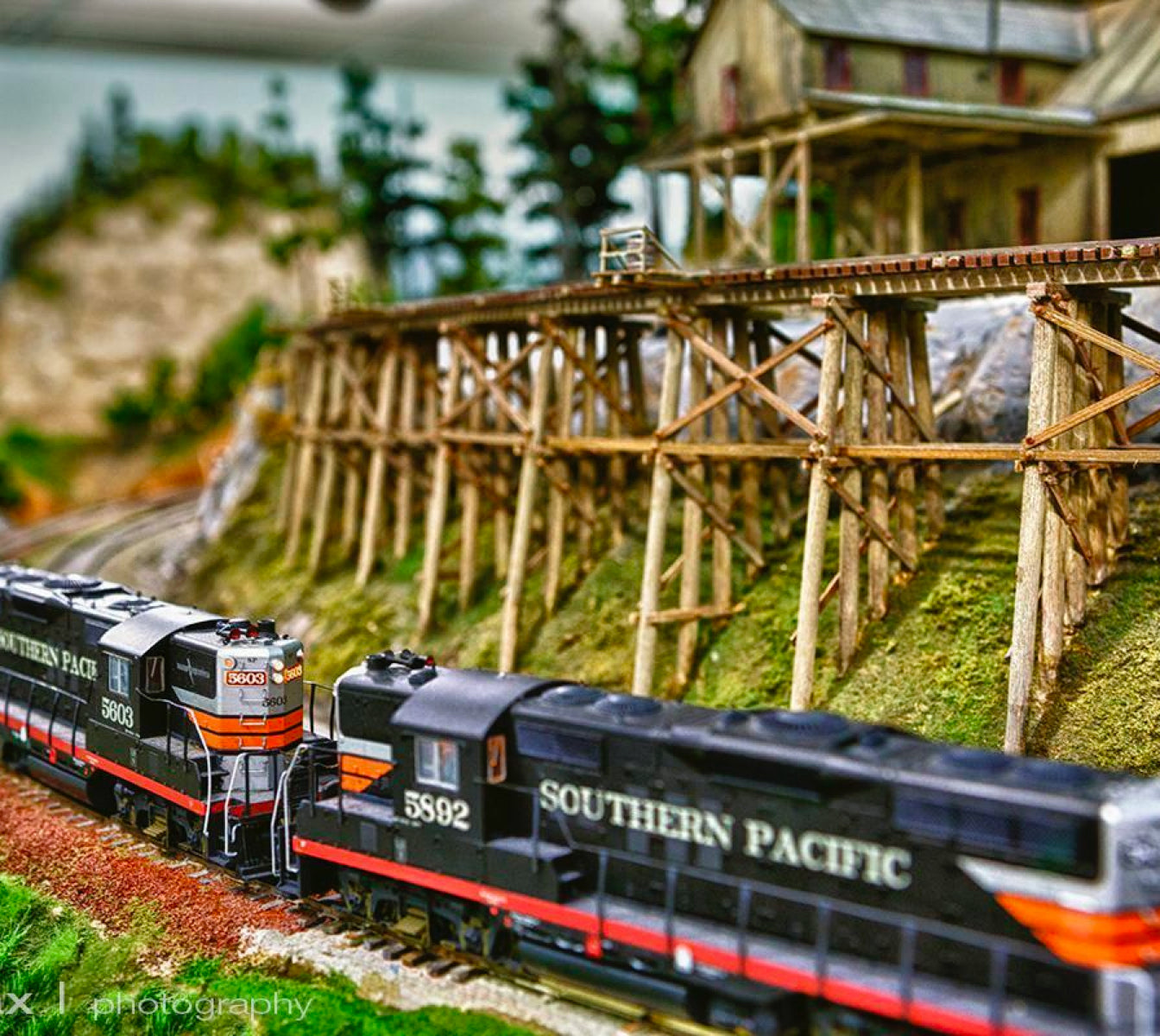 Model Train Layout of the Southern pacific railroad. You can see a Diesel Locomotive with an A & B unit