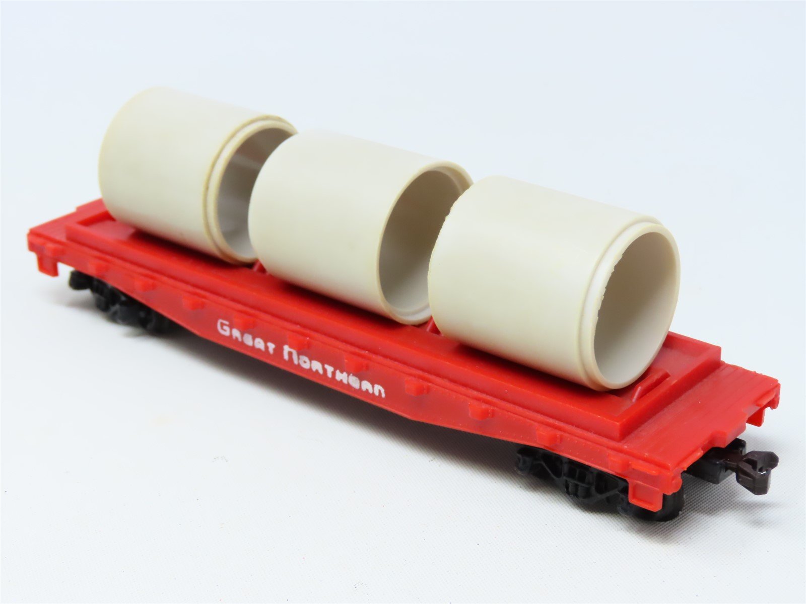 HO Scale TYCO #342D GN Great Northern Flat Car w. Pipe Load