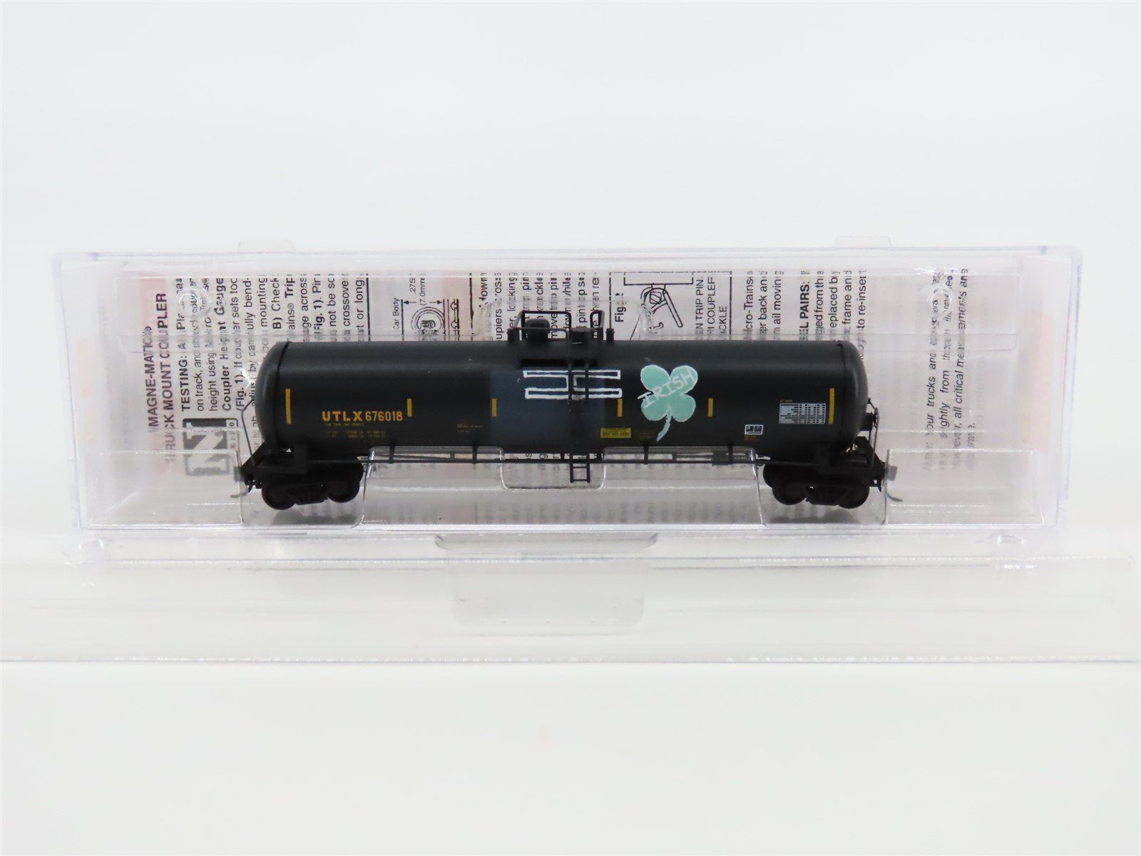 N Scale Micro-Trains MTL #11044480 UTLX 56' Tank Car #676018 w/ Clover Graffiti