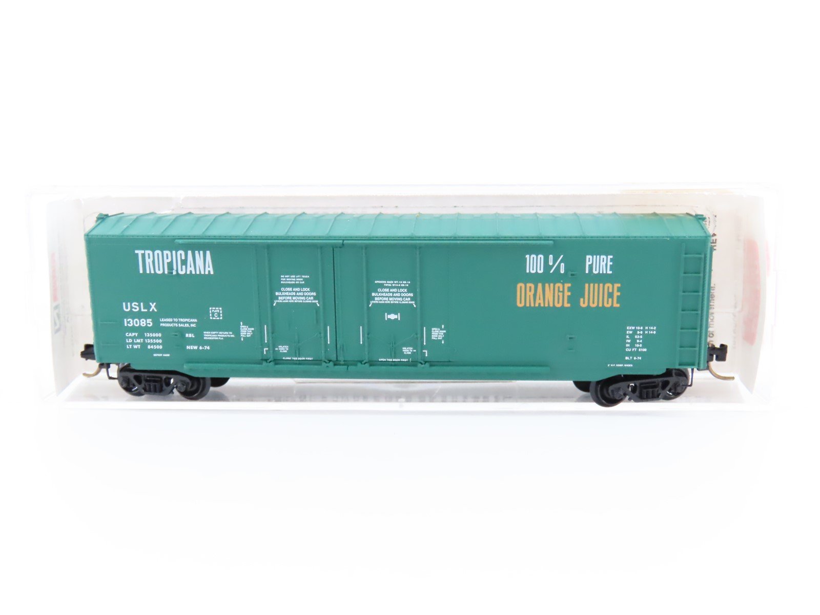 N Scale Micro-Trains MTL #75040 USLX Tropicana 50' Plug Door Box Car #13085