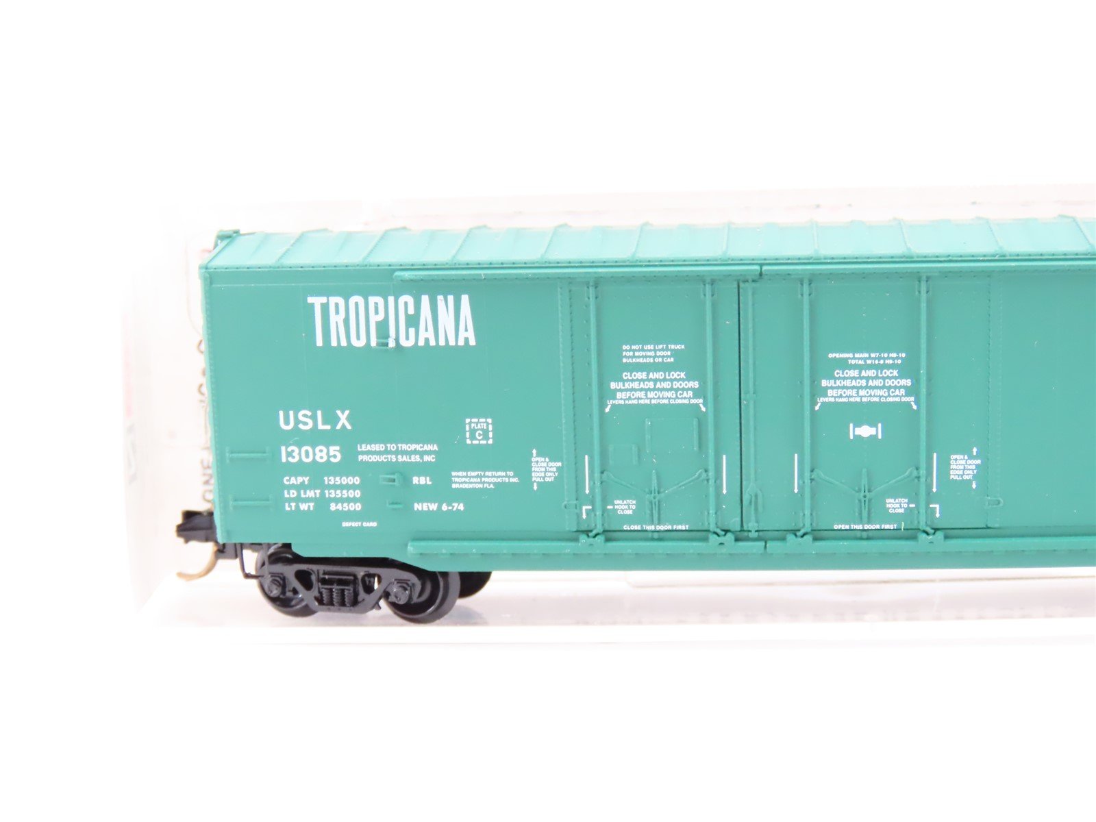 N Scale Micro-Trains MTL #75040 USLX Tropicana 50' Plug Door Box Car #13085