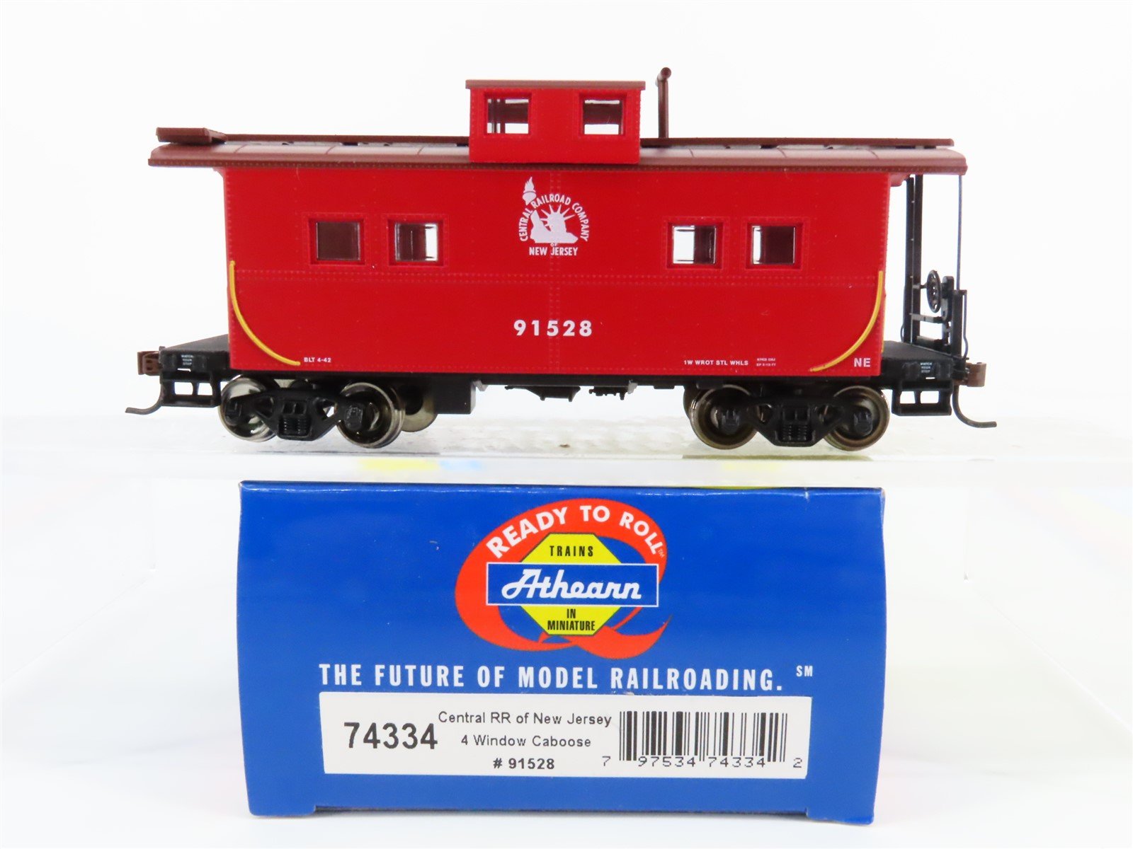 HO Scale Athearn #74334 CNJ Jersey Central 4-Window Caboose #91528