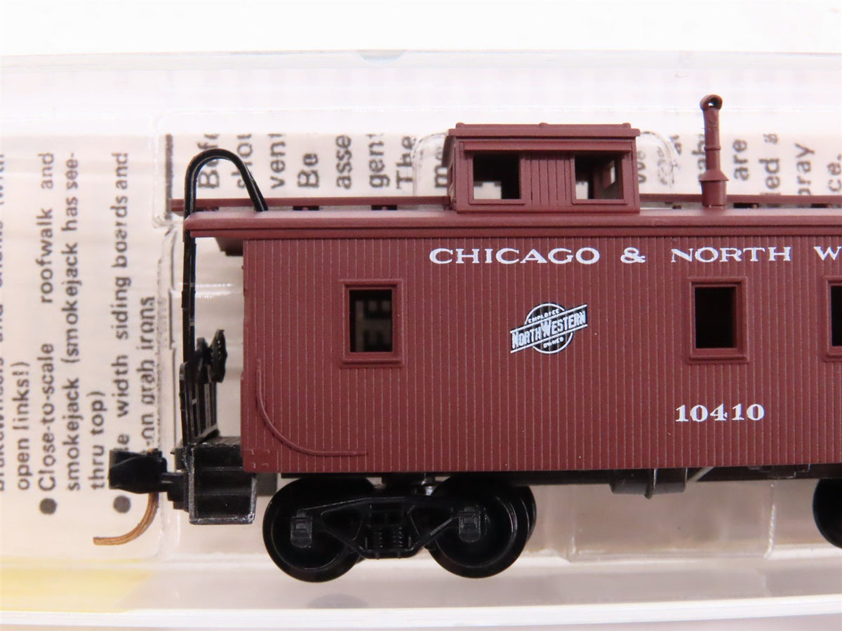 N Scale Kadee Micro-Trains MTL 50200 CNW 34&#39; Offset Cupola Wood Caboose #10410