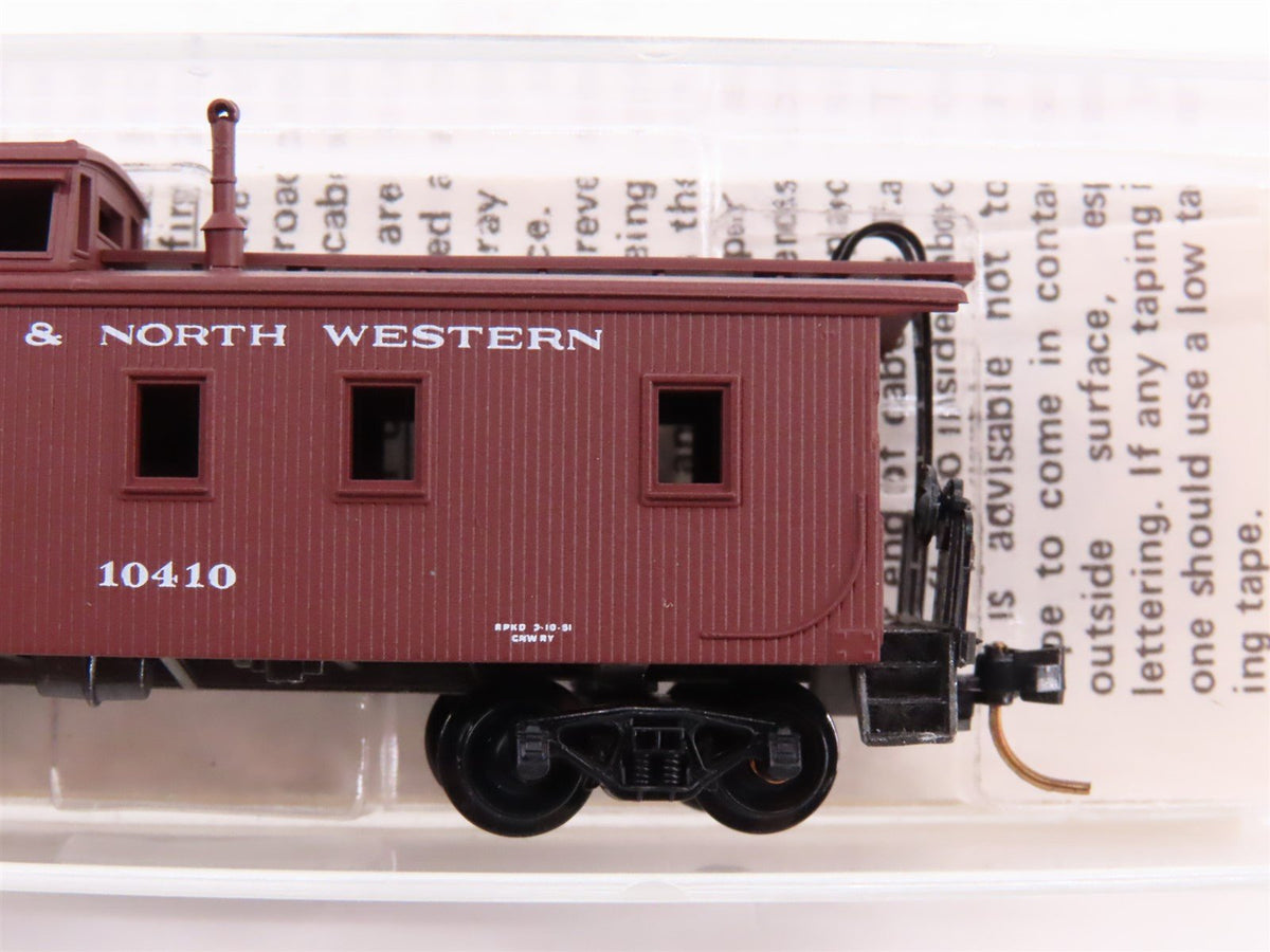 N Scale Kadee Micro-Trains MTL 50200 CNW 34&#39; Offset Cupola Wood Caboose #10410