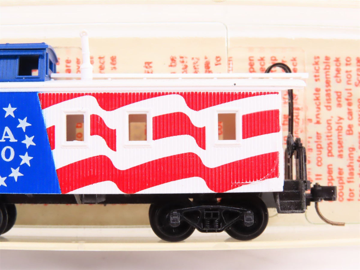 N Kadee Micro-Trains MTL 50990 USA 200 Bicentennial 34&#39; Offset Cupola Caboose