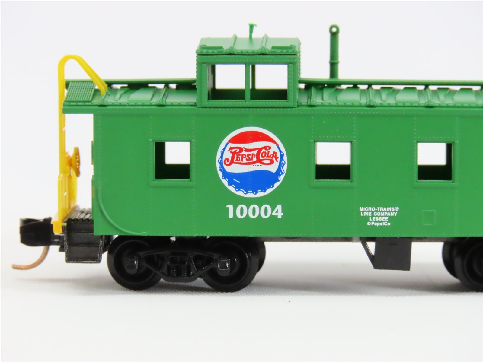 N Scale Micro-Trains MTL 100080 Pepsi-Cola 36' Riveted Steel Side Caboose #10004