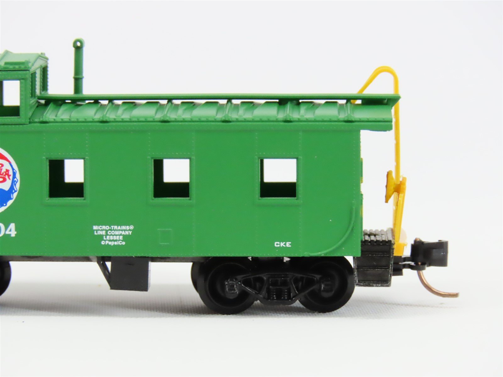 N Scale Micro-Trains MTL 100080 Pepsi-Cola 36' Riveted Steel Side Caboose #10004