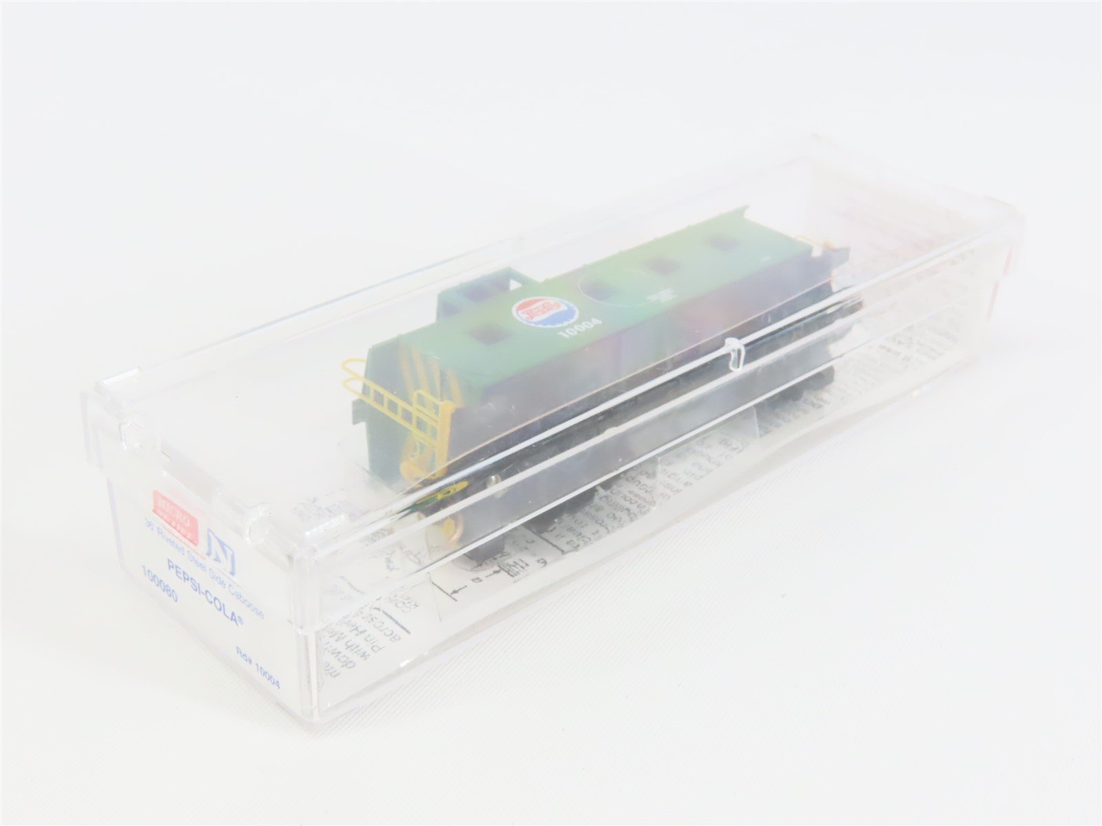 N Scale Micro-Trains MTL 100080 Pepsi-Cola 36' Riveted Steel Side Caboose #10004