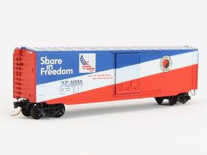 N Micro-Trains MTL 77010 NP Northern Pacific Share In Freedom 50' Boxcar #31555