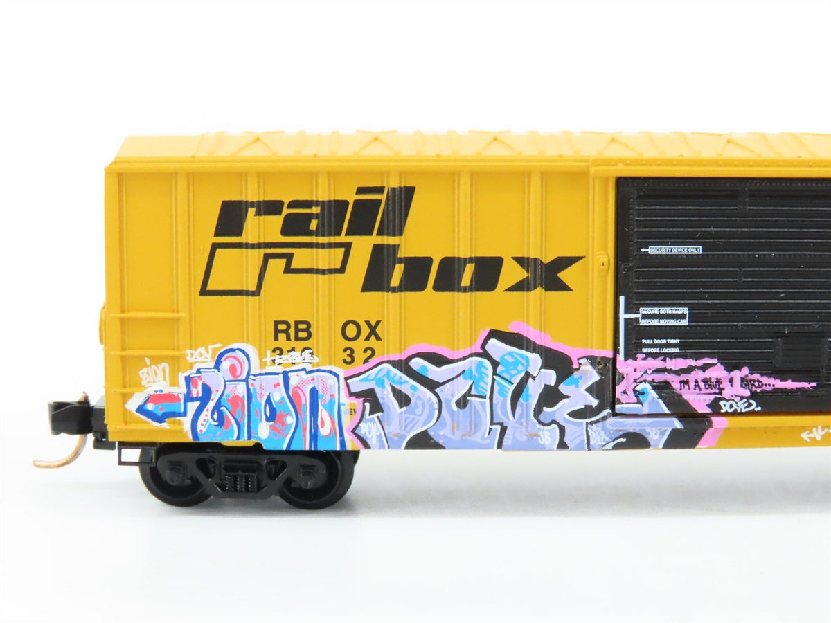 N Scale Micro-Trains MTL GCS RBOX Railbox &quot;Blue Bird&quot; Boxcar #31032 w/ Graffiti
