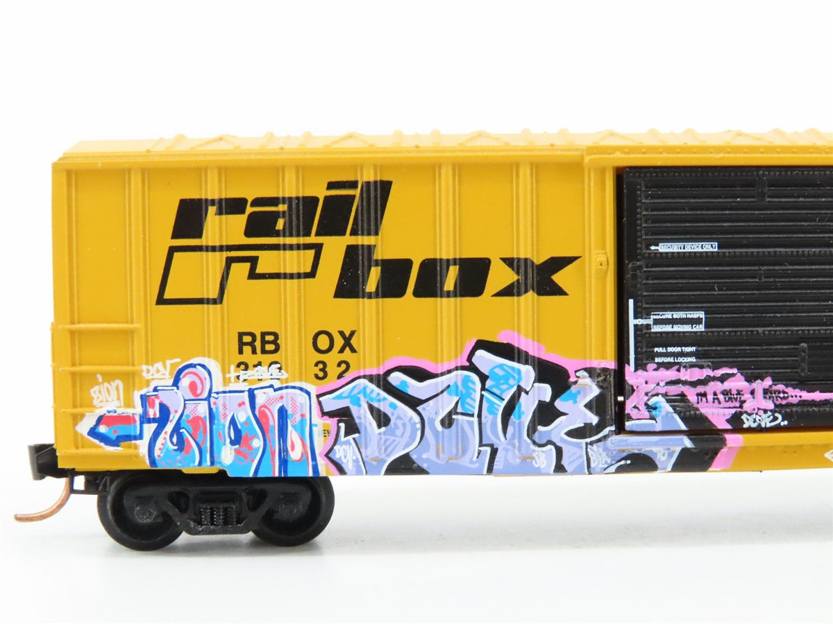 N Scale Micro-Trains MTL GCS RBOX Railbox &quot;Blue Bird&quot; Boxcar #31032 w/ Graffiti
