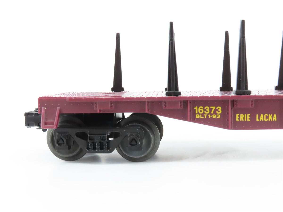 O Gauge 3-Rail Lionel 6-16373 EL Erie Lackawanna Flatcar w/ Stakes &amp; Load 16373