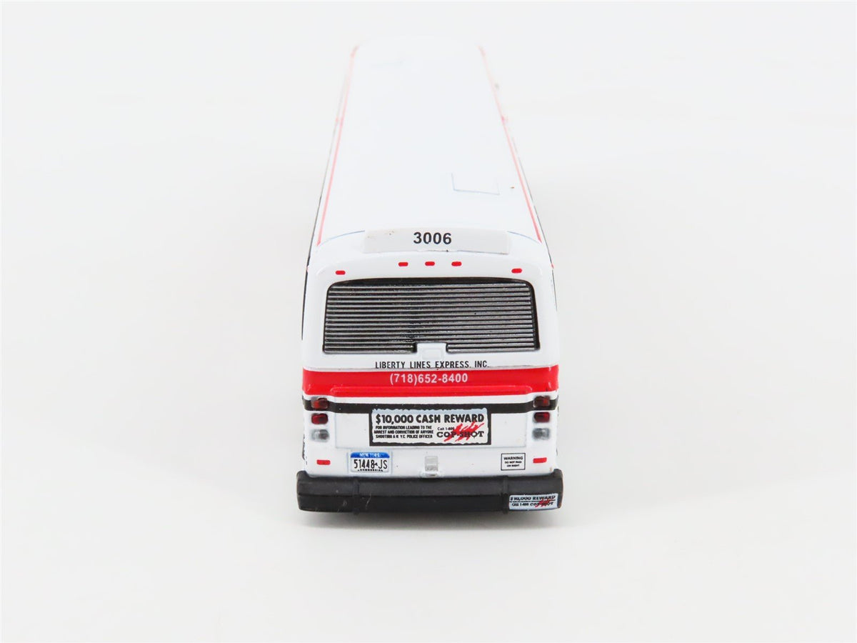1:87 Iconic Replicas Die-Cast 87-0389 Liberty Lines Suburban MCI Classic Bus