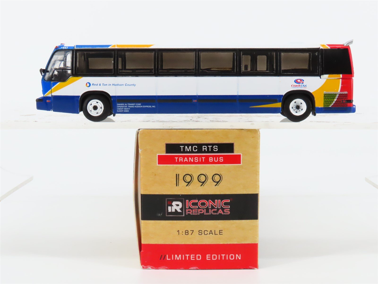 1:87 Iconic Replicas 87-0318 Coach USA "Red & Tan" 1999 TMC RTS Transit Bus