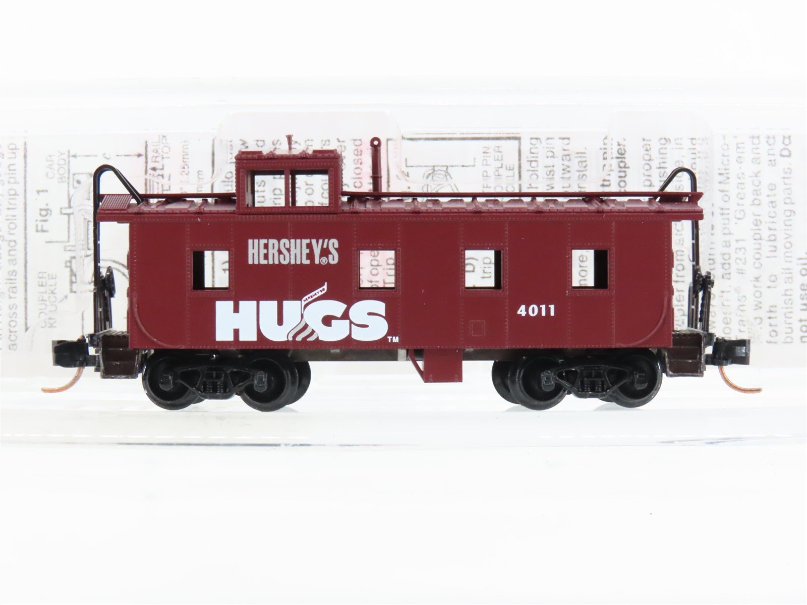 N Scale Micro-Trains MTL 100120 Hershey's Hugs Offset Cupola Steel Caboose #4011