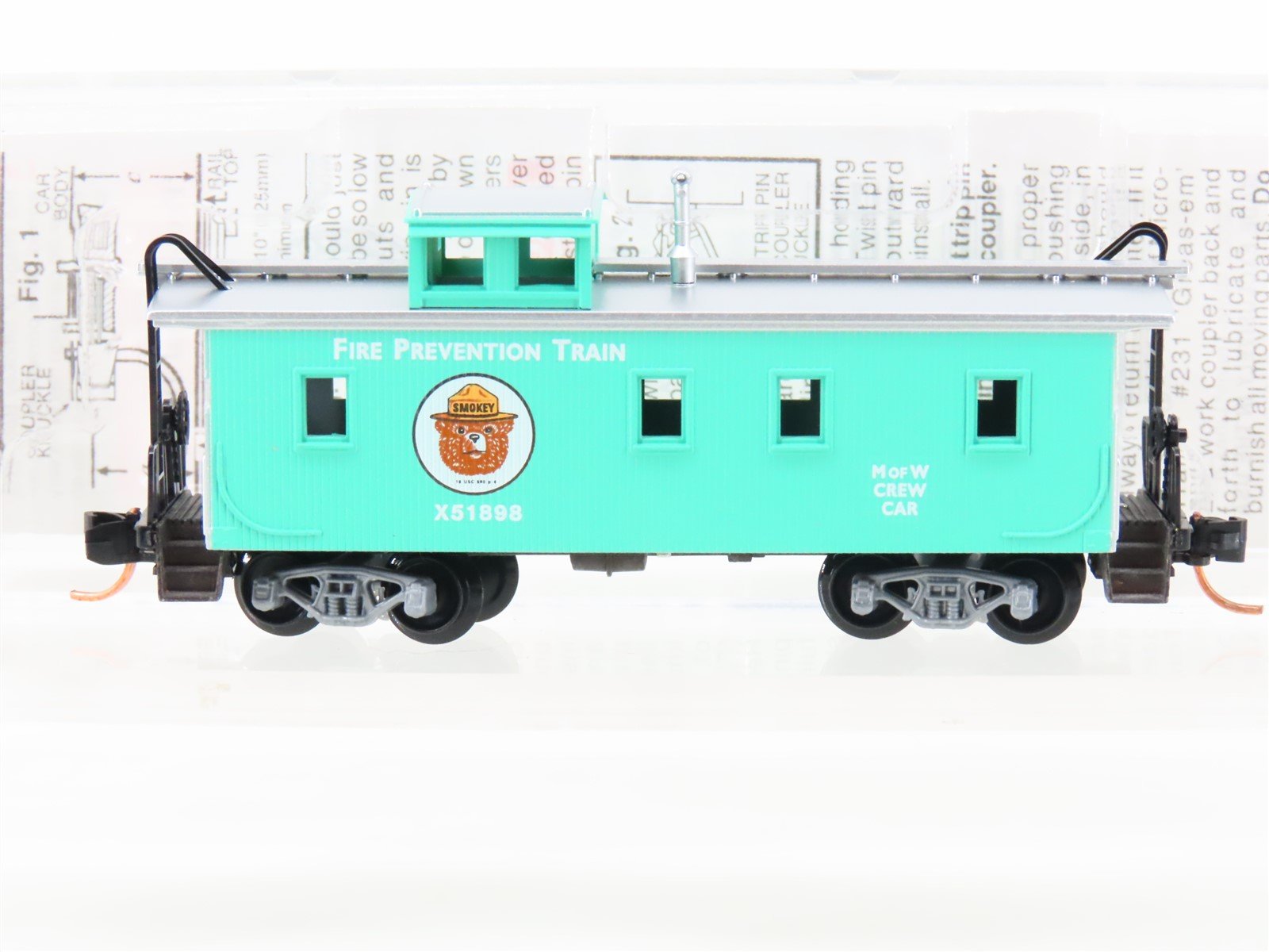 N Scale Micro-Trains MTL 51210 MOW Smokey Bear 34' Wood Sheathed Caboose #X51898