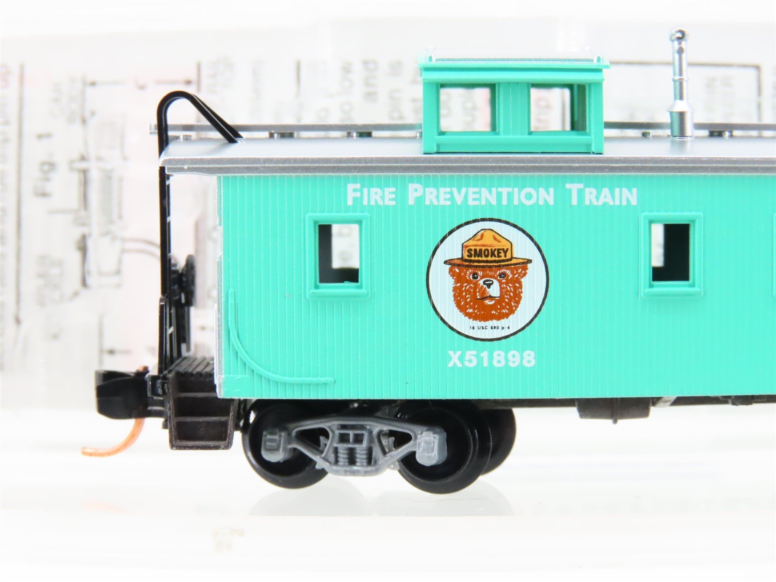 N Scale Micro-Trains MTL 51210 MOW Smokey Bear 34' Wood Sheathed Caboose #X51898
