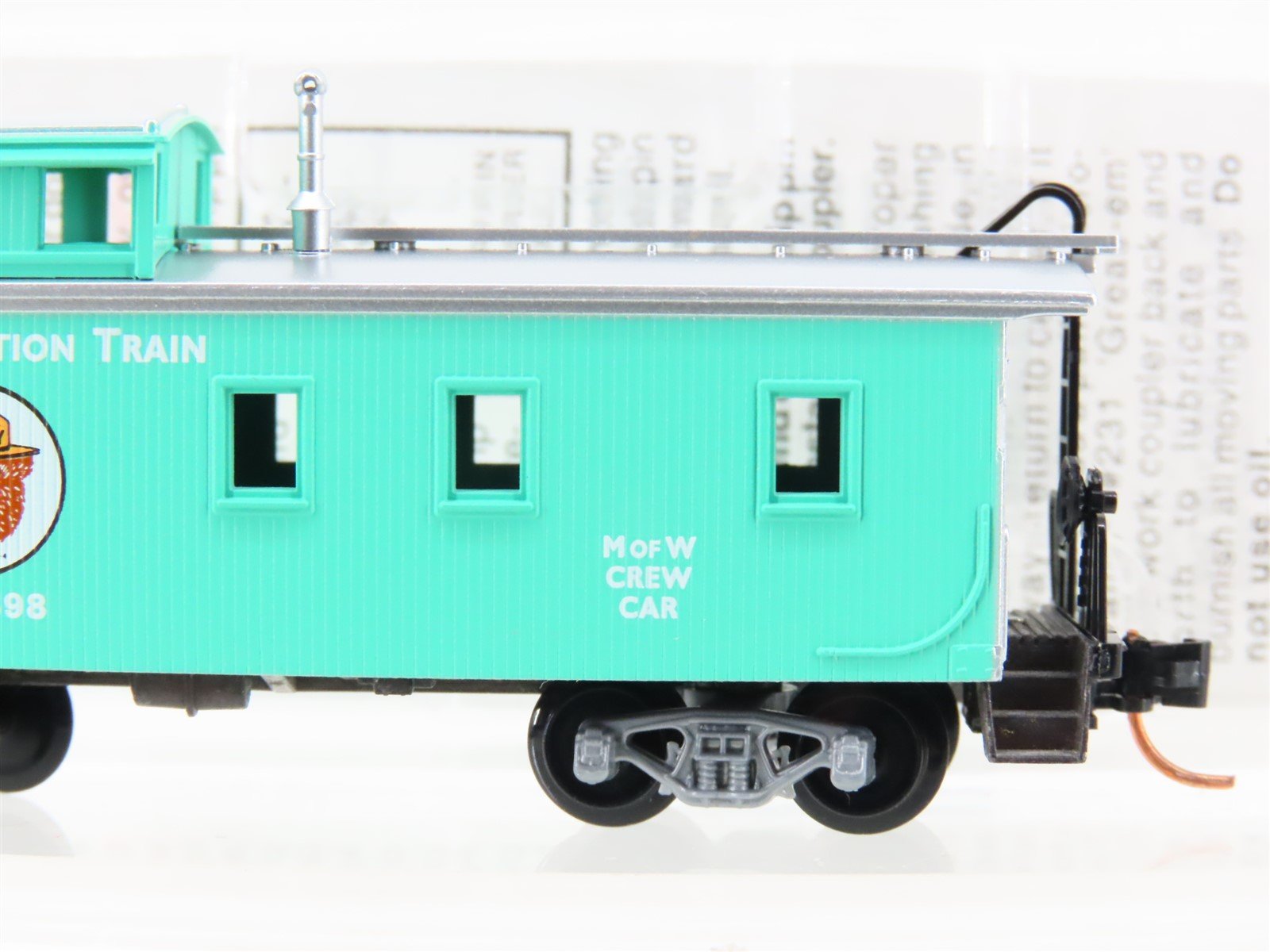 N Scale Micro-Trains MTL 51210 MOW Smokey Bear 34' Wood Sheathed Caboose #X51898