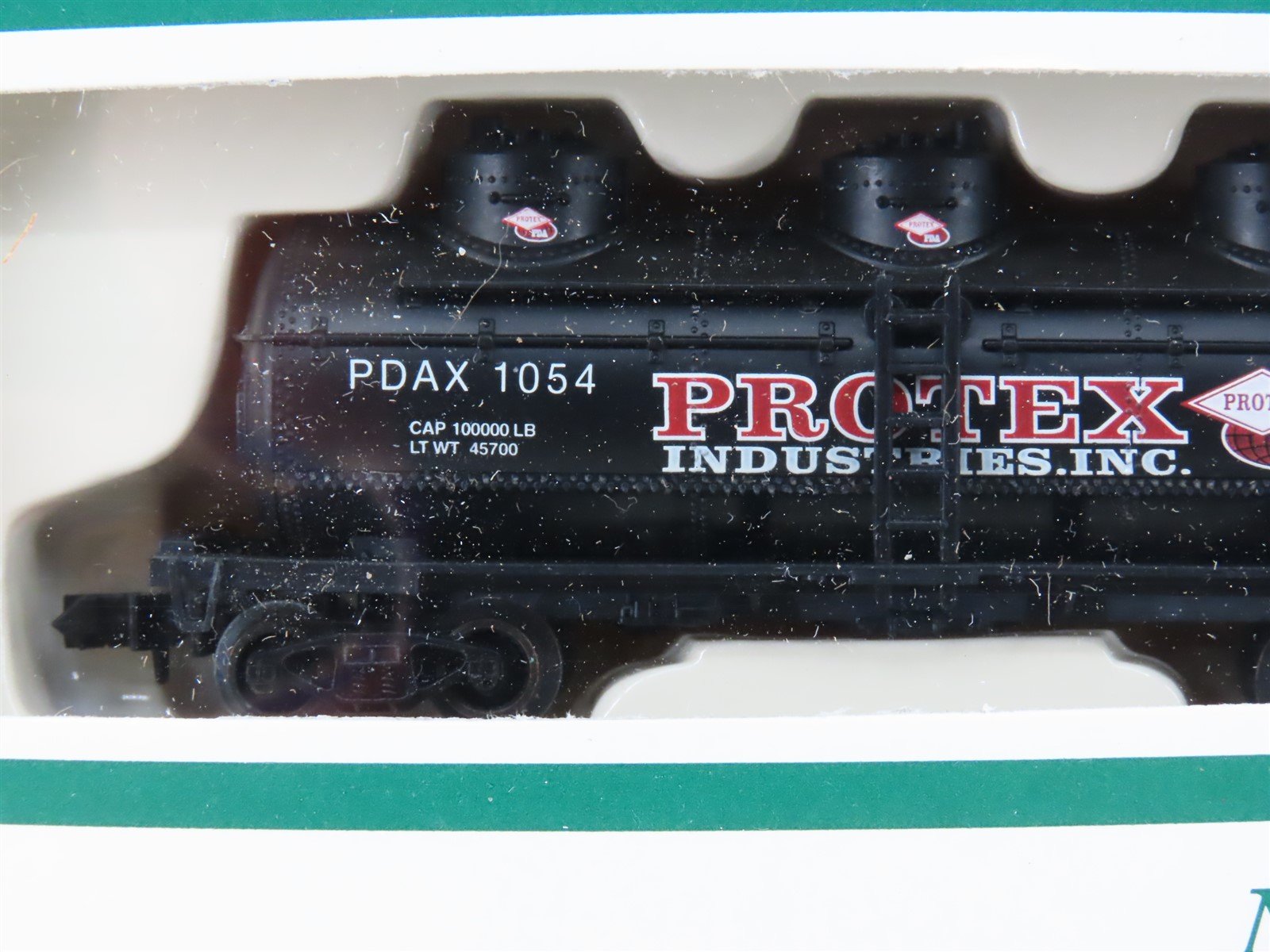 N Scale Industrial Rail #7793 PDAX Protex Industries 3-Dome Tank Car #1054