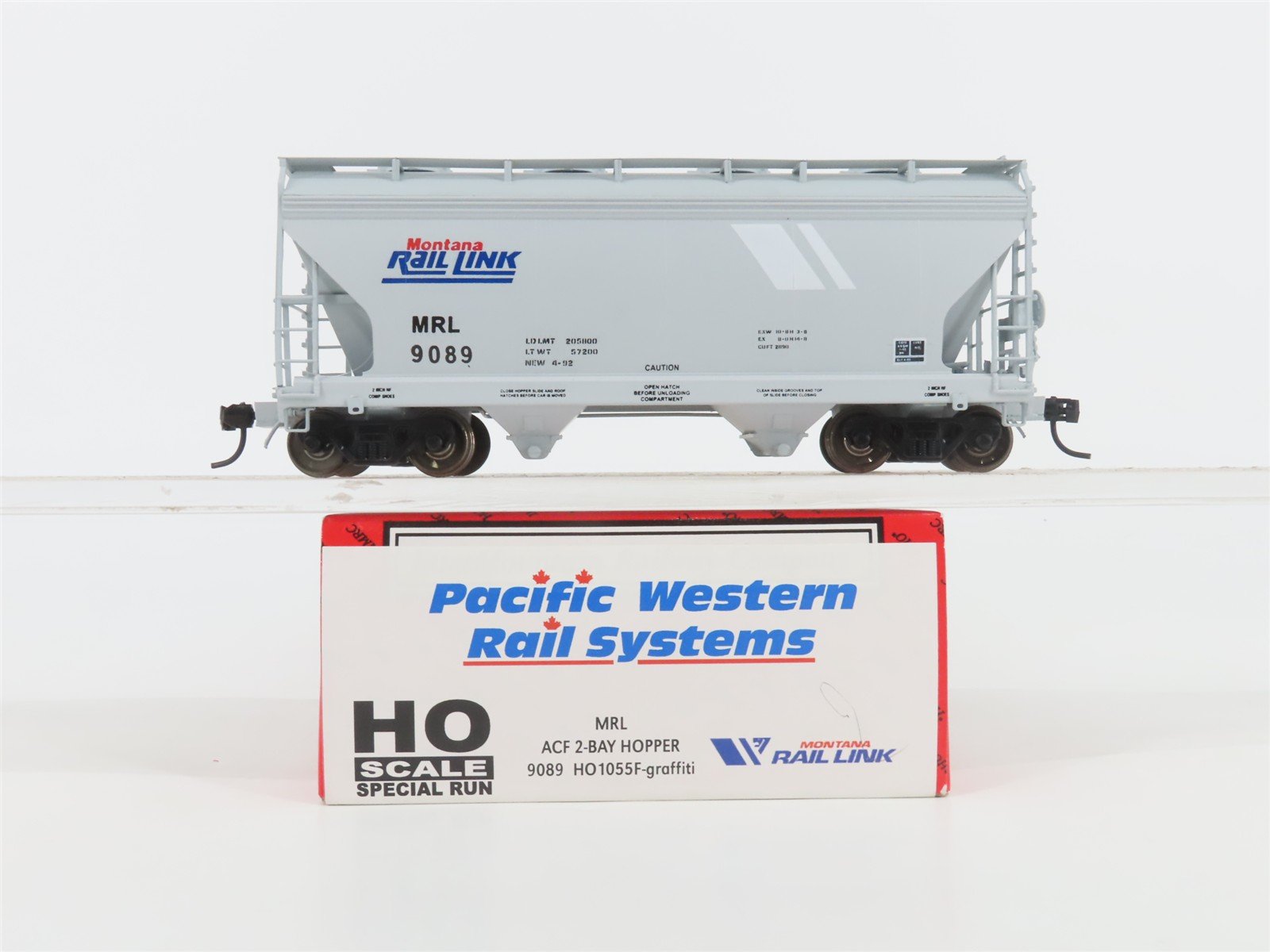 HO InterMountain PWRS 1055F MRL Montana Rail Link 2-Bay Hopper #9089 w/ Graffiti