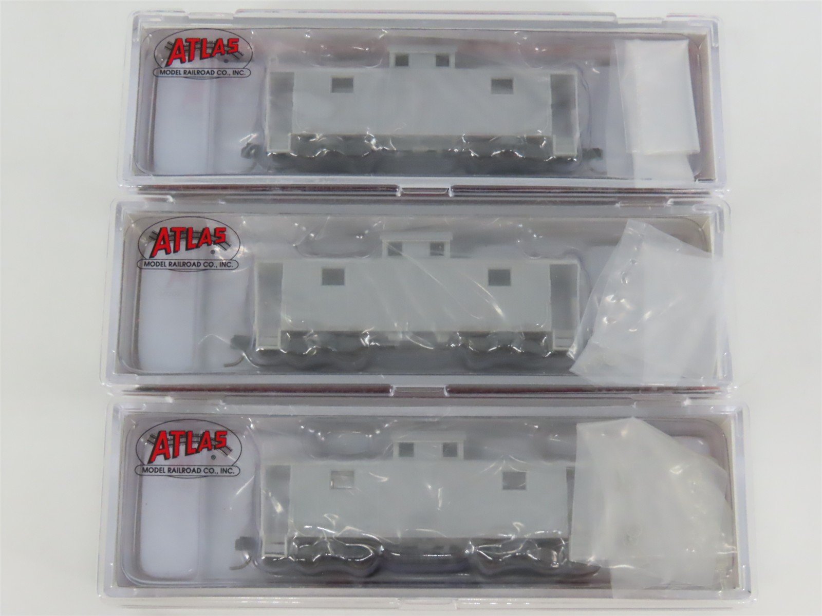 N Scale Atlas 50003495 Undecorated NE-5 Caboose 3-Pack