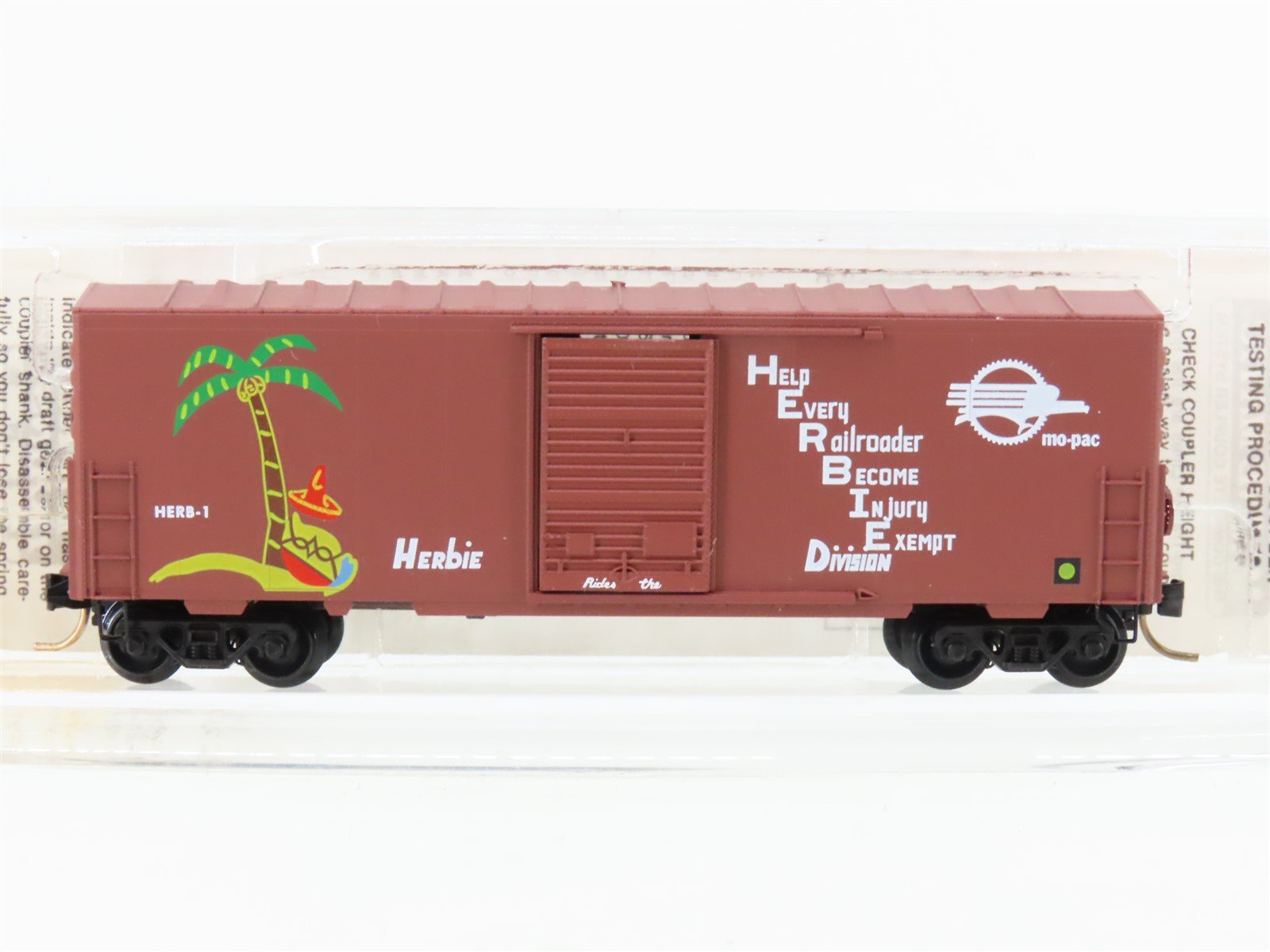 N Scale Micro-Trains MTL 24220 MP Mo-Pac Herbie 40' Single Door Box Car #HERB-1