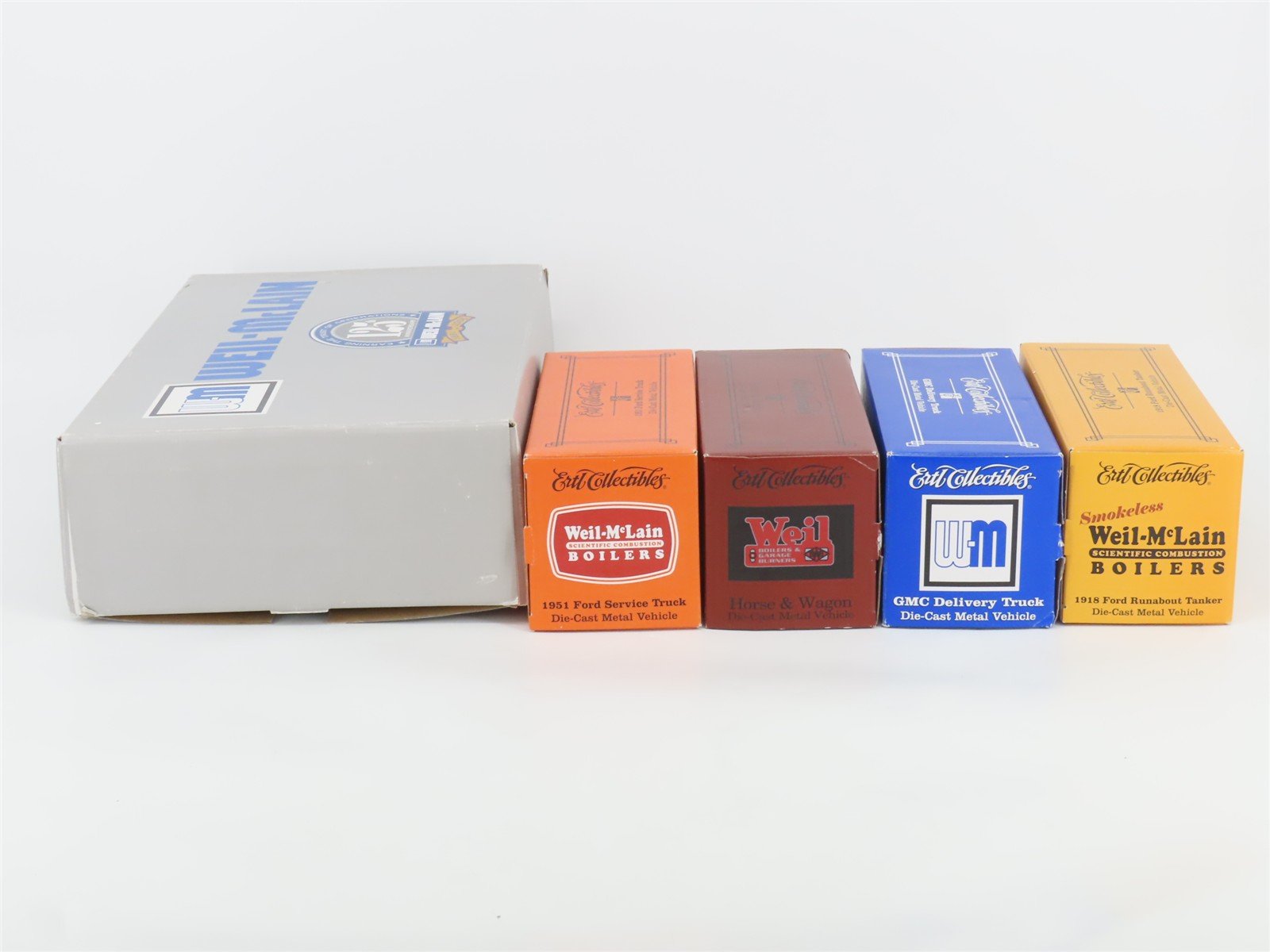 Ertl 21625 Die-Cast Weil-McLain 125th Anniversary Trucks & Wagon 4-Piece Set