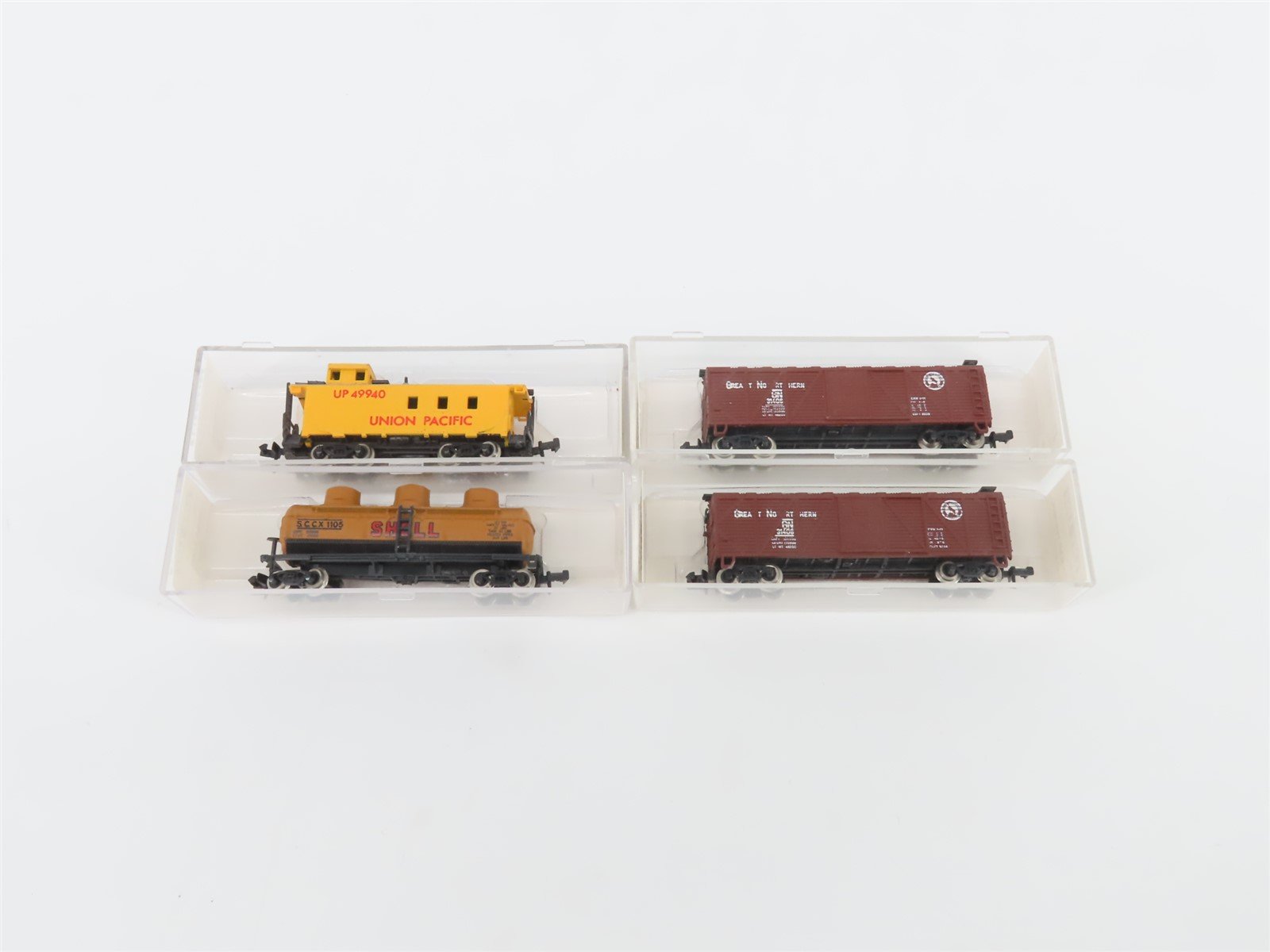 LOT of 4 N Scale Life-Like UP/GN/Shell Caboose, Tankcar, and Boxcars