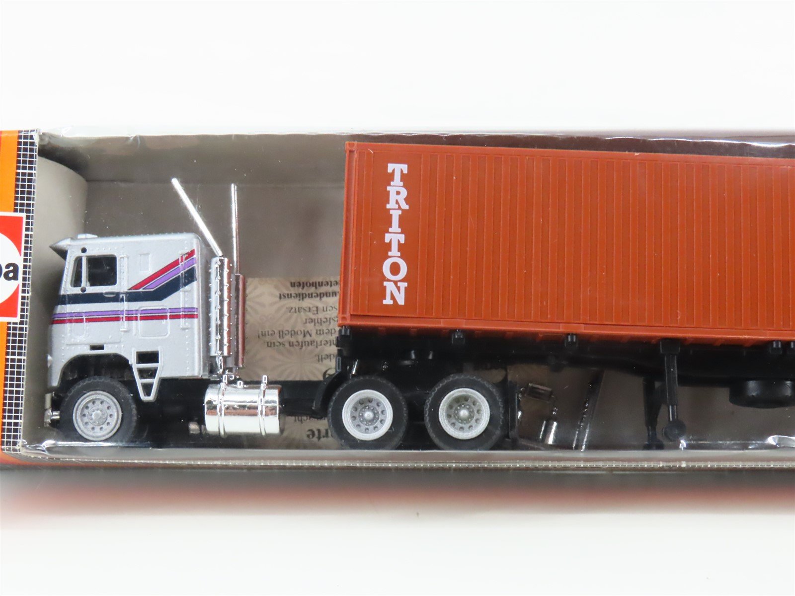 HO Scale Herpa 854223 Gray & Striped Tractor Trailer w/ Triton Container