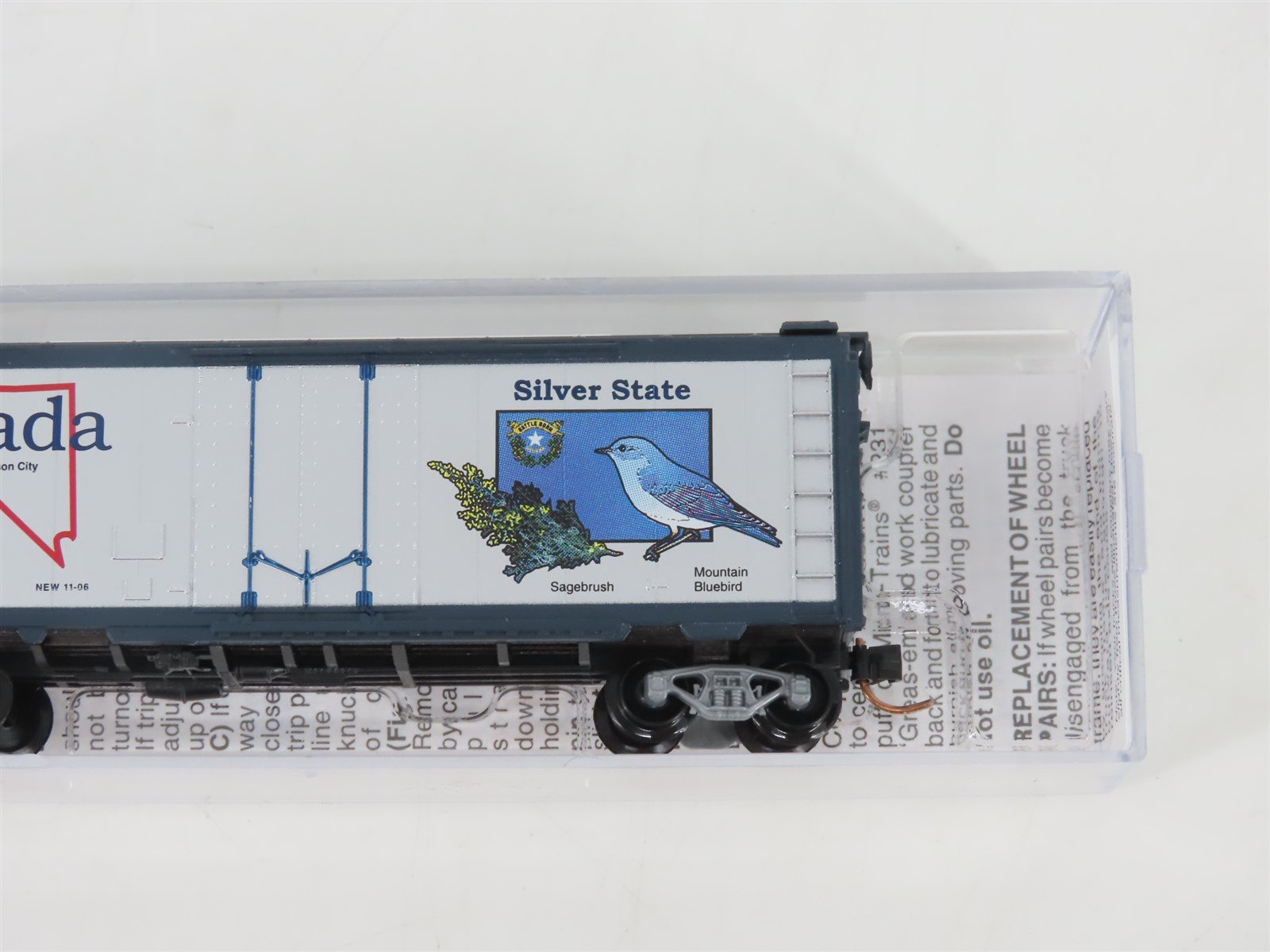 N Scale Micro-Trains MTL 02100407 NV Nevada State 40' Plug Door Box Car #1864