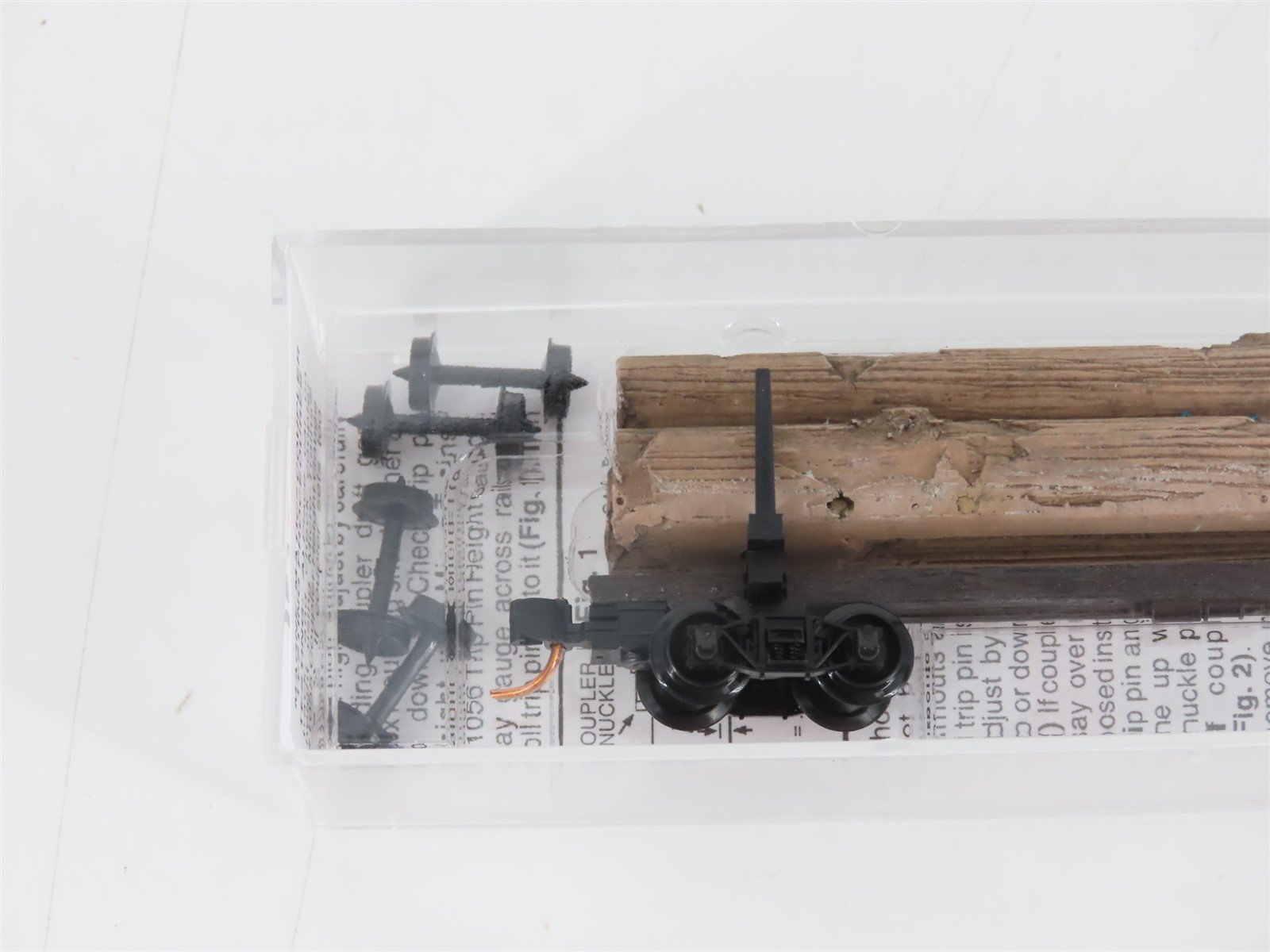 N Scale Micro-Trains MTL 11400040 40' Modern Log Car w/ Uprights & Log Load