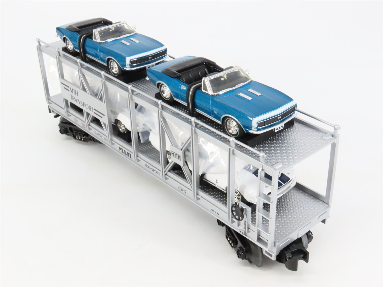 O27 3-Rail MTH RailKing 30-7666 Auto-Carrier #6767 w/ Ertl '67 Camero & Shelby