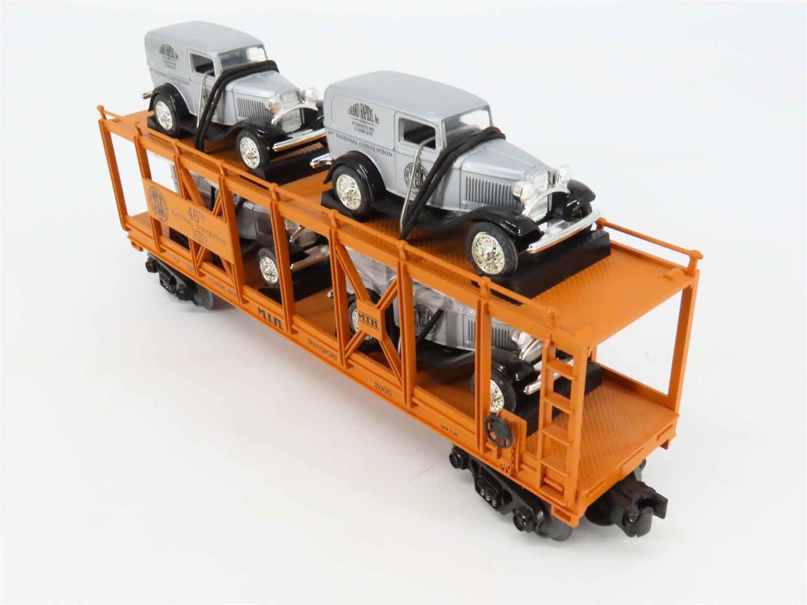 O27 3-Rail MTH RailKing 30-7667 TCA Auto Carrier #2000 w/ Ertl '32 Panel Vans