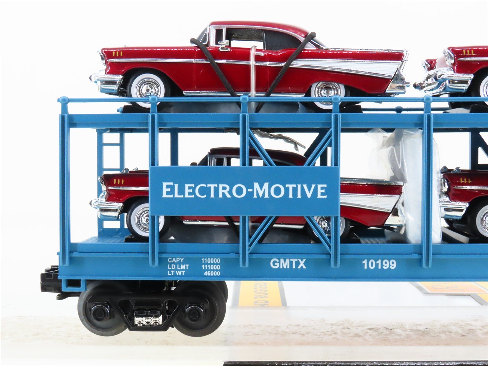 O Gauge 3-Rail MTH 30-7012B EMD/GMTX Auto Carrier #10199 w/ERTL 57' Chevy's
