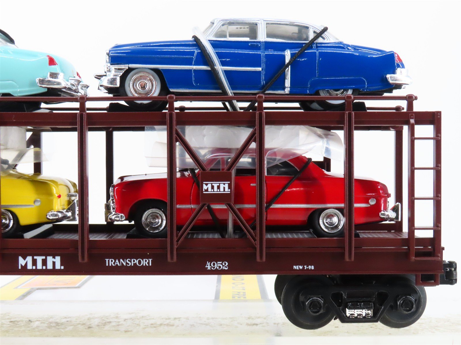 O Gauge 3-Rail MTH 30-7628 MTH Auto Carrier #4952 w/ERTL Cadillac & Ford Cars