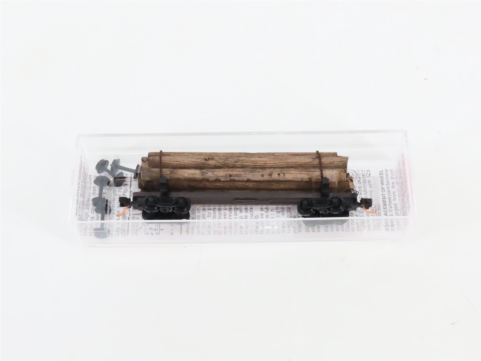 N Scale Micro-Trains MTL 113040 Unlettered 40' Skeleton Log Car w/ Log Load