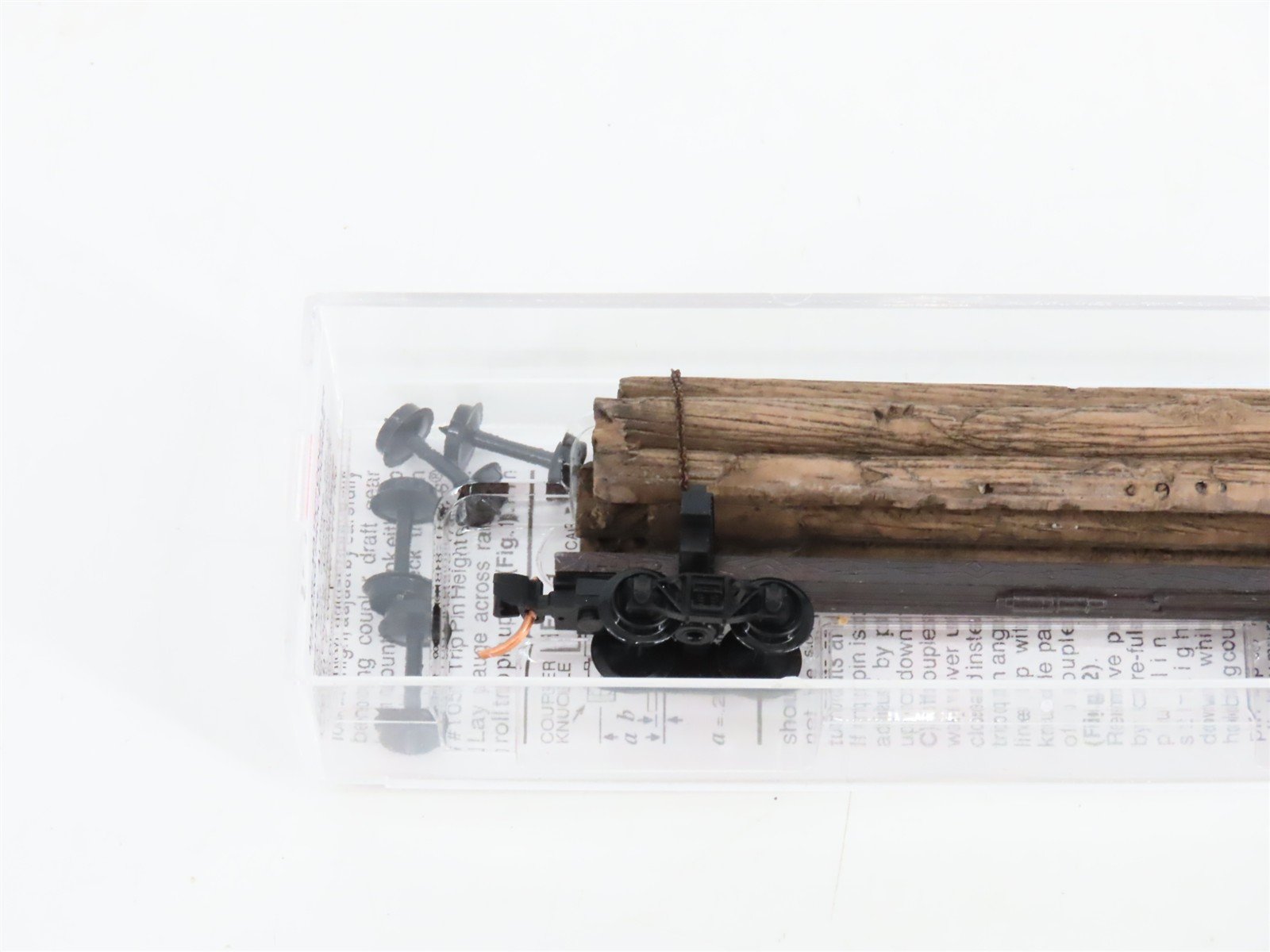 N Scale Micro-Trains MTL 113040 Unlettered 40' Skeleton Log Car w/ Log Load