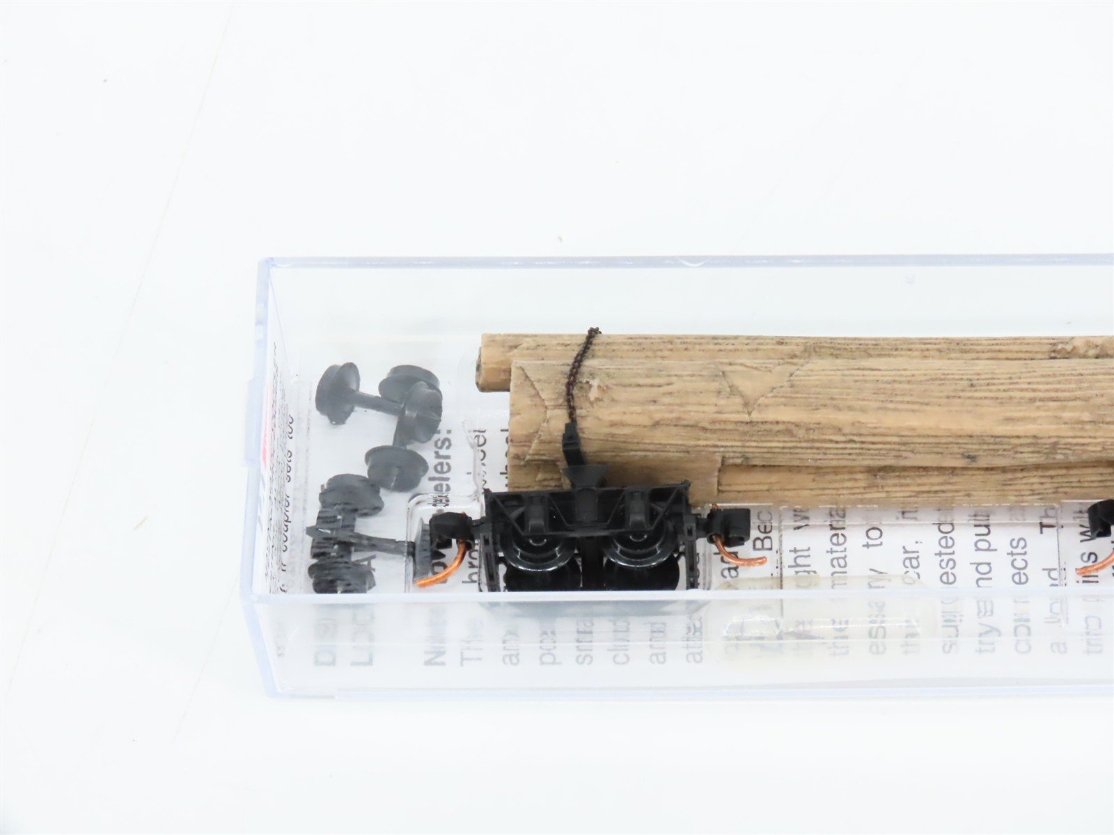 N Scale Micro-Trains MTL 11300730 Unlettered Disconnect Log Car w/ Log Load