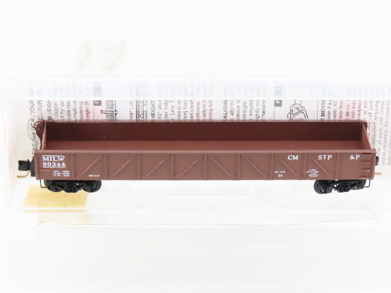 N Micro-Trains MTL 60010 CMSTP&P MILW Milwaukee Road 50' Drop-End Gondola #80344