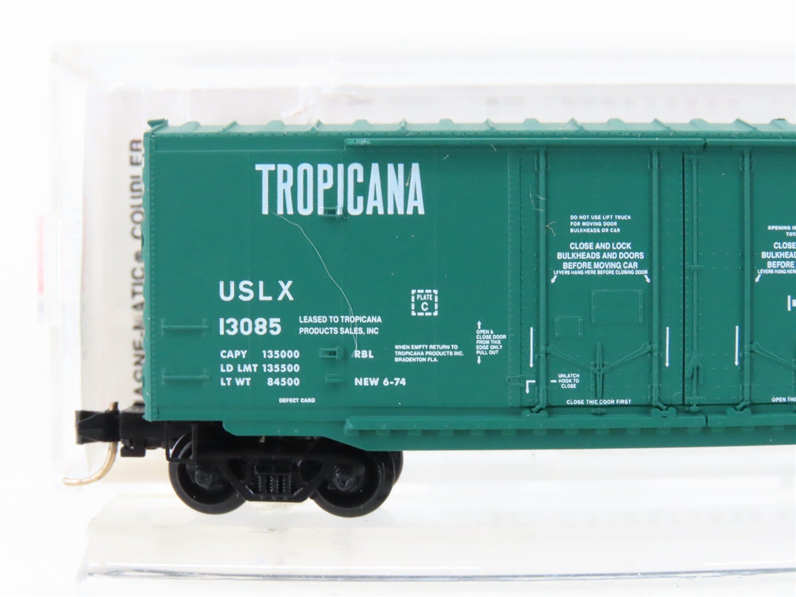 N Scale Micro-Trains MTL 75040 USLX Tropicana 50' Plug Door Box Car #13085