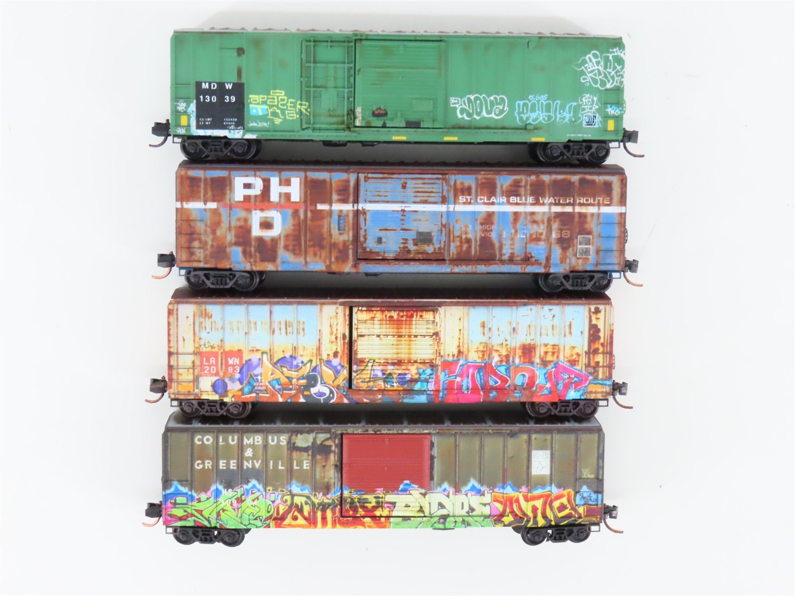 N Scale Micro-Trains MTL 99305530 Ex-Per Diem Graffiti Boxcar 4-Car Runner Pack