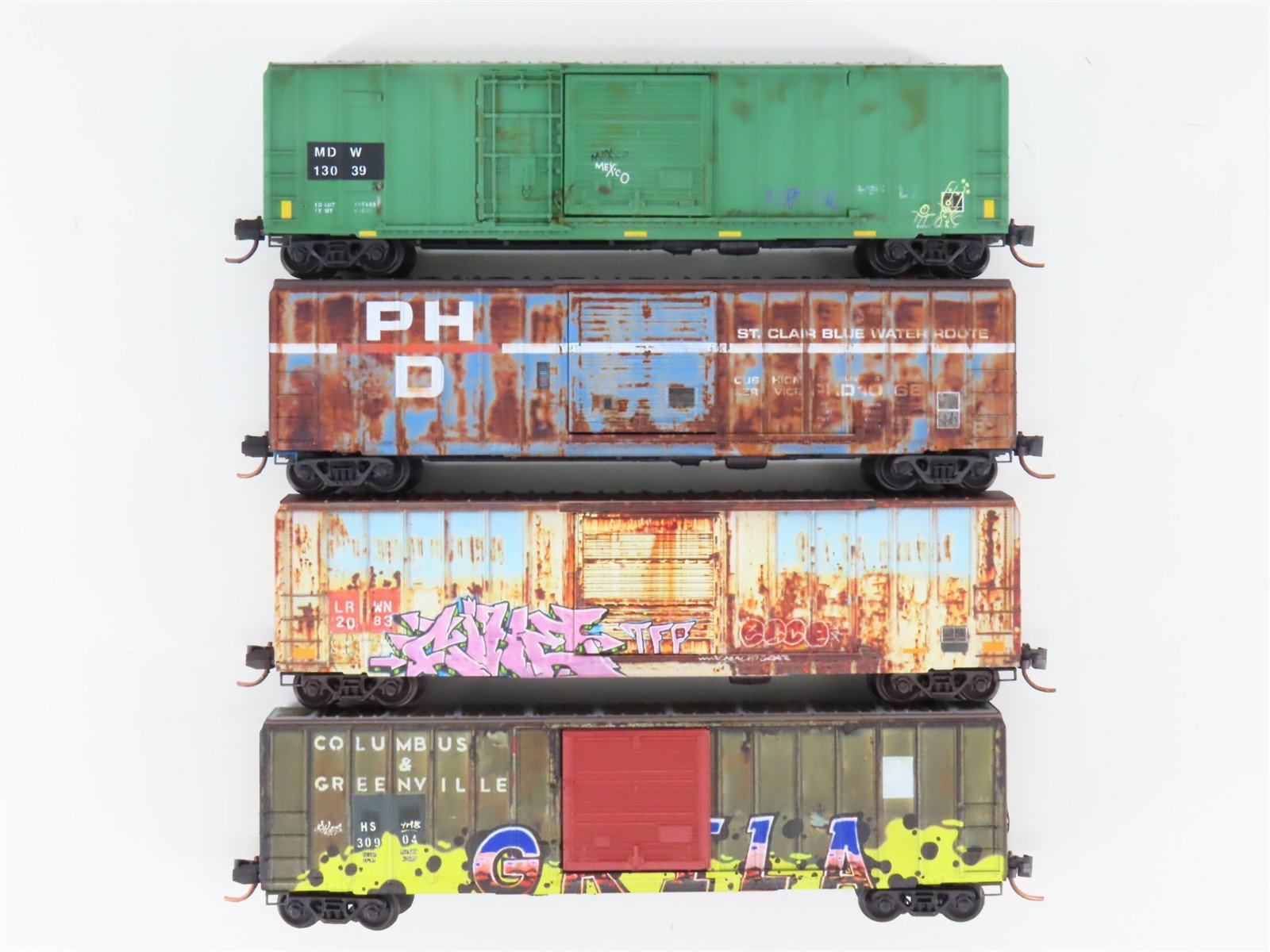 N Scale Micro-Trains MTL 99305530 Ex-Per Diem Graffiti Boxcar 4-Car Runner Pack