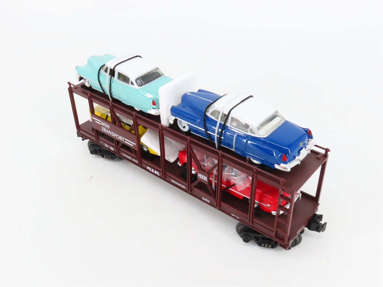 O27 3-Rail MTH RailKing 30-7628 Auto Carrier 4952 w/Ertl '52 Cadillac & '49 Ford