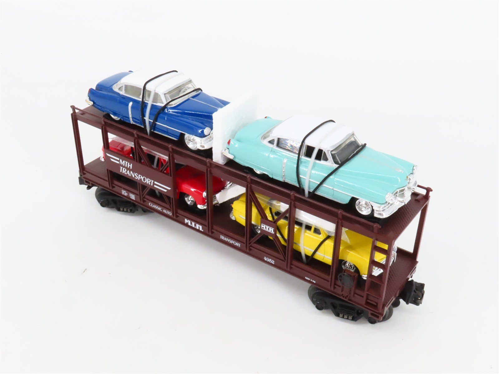 O27 3-Rail MTH RailKing 30-7628 Auto Carrier 4952 w/Ertl '52 Cadillac & '49 Ford