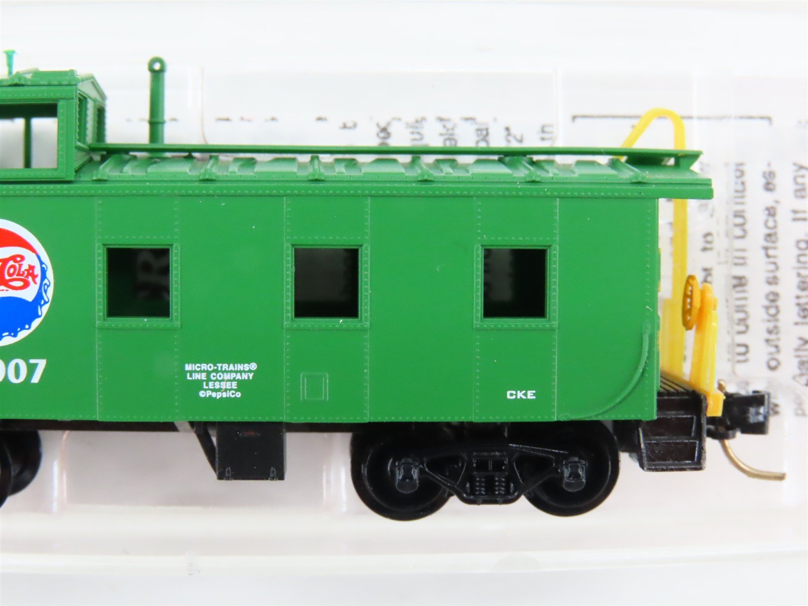 N Scale Micro-Trains MTL 100080 Pepsi Cola 36' Riveted Steel Side Caboose #10007