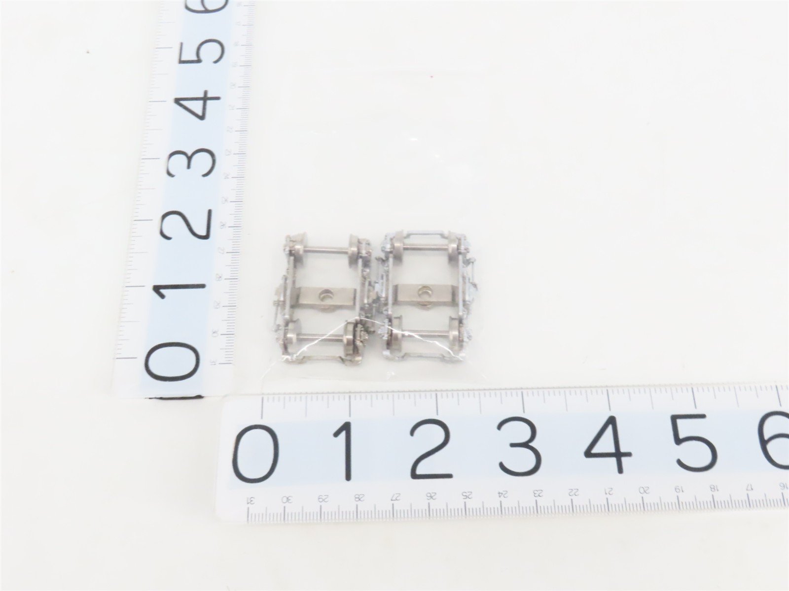 HO Scale 4-Wheel Metal Sprung Trucks w/ Metal Wheels - 2 Pairs