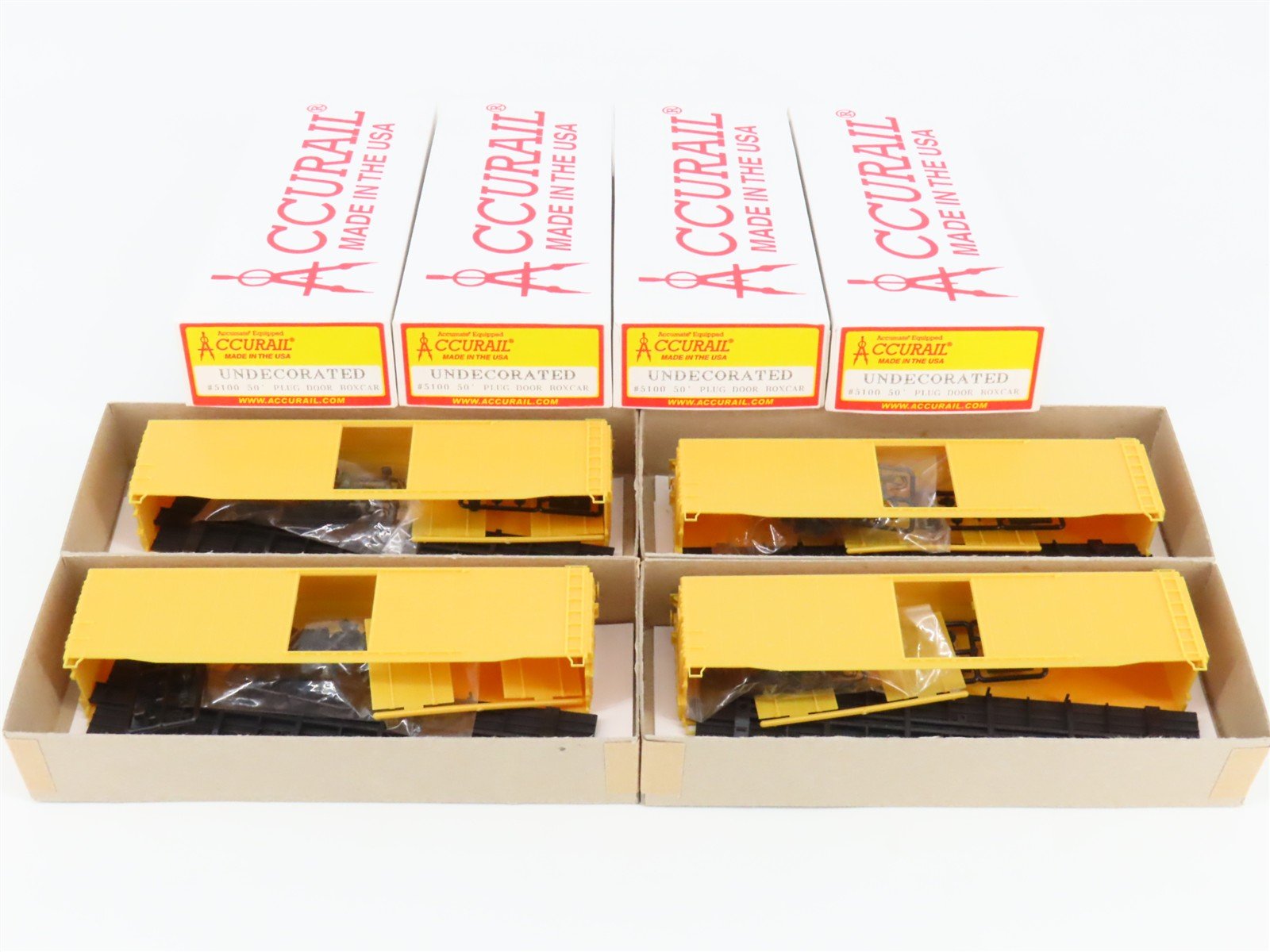 LOT of 4 HO Scale Accurail Kit #5100 Undecorated Yellow 50' Plug Door Box Car