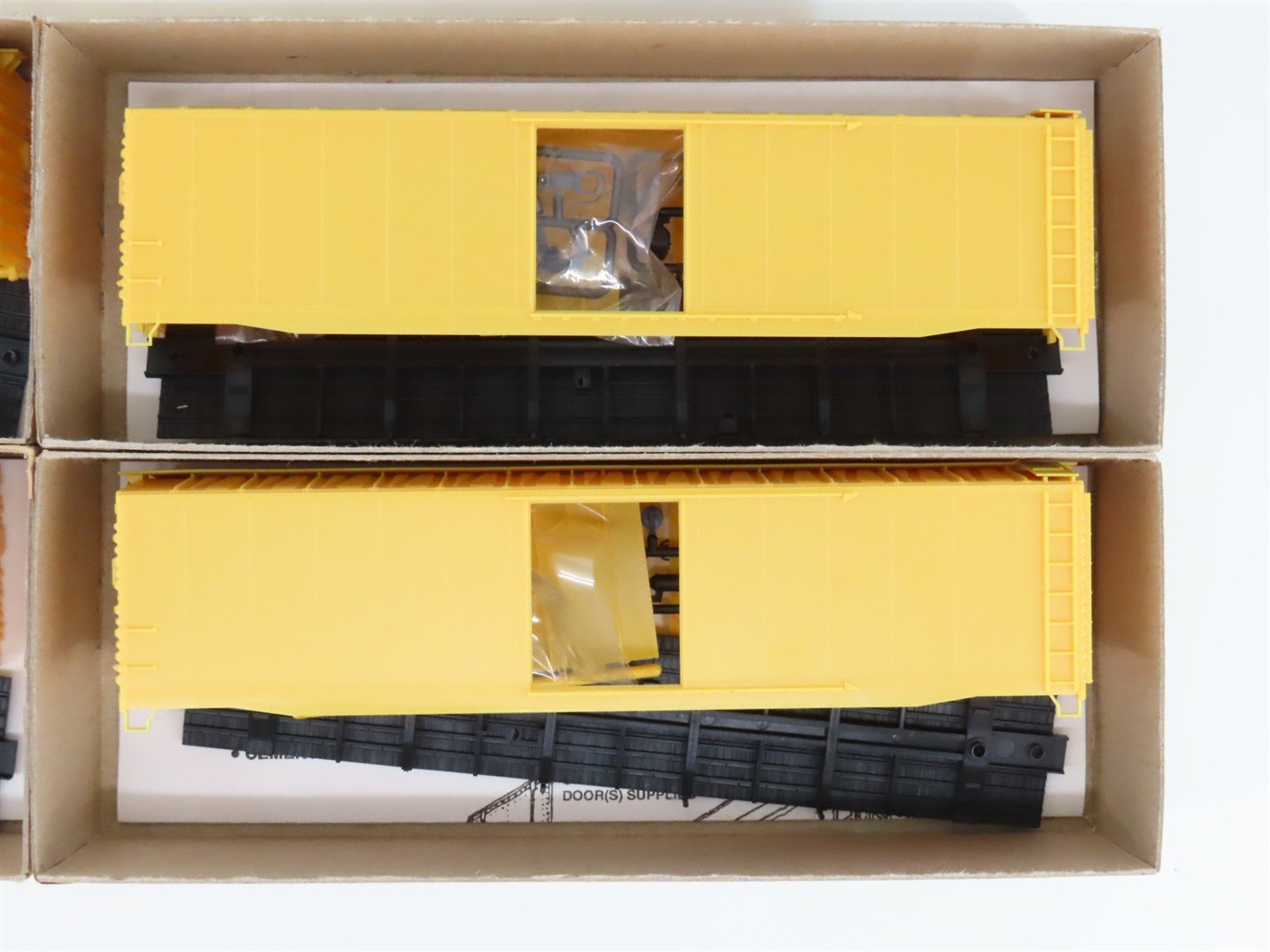 LOT of 4 HO Scale Accurail Kit #5100 Undecorated Yellow 50' Plug Door Box Car