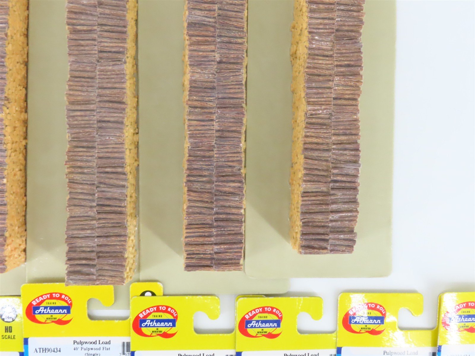 LOT of 21 HO Scale Walthers, Athearn Assorted Size Pulpwood Loads