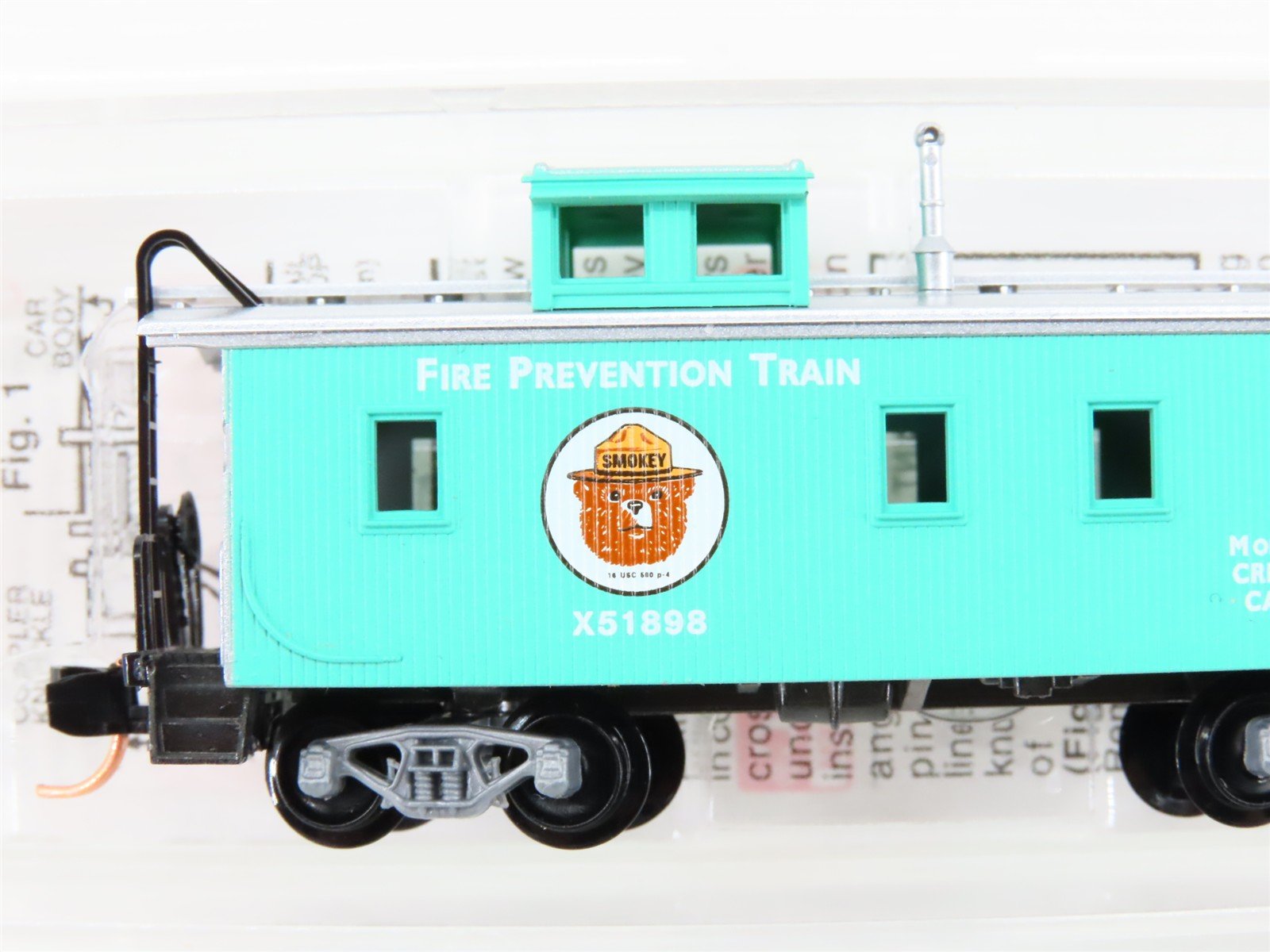 N Scale Micro-Trains MTL 51210 Smokey Bear 34' Wood Caboose #X51898